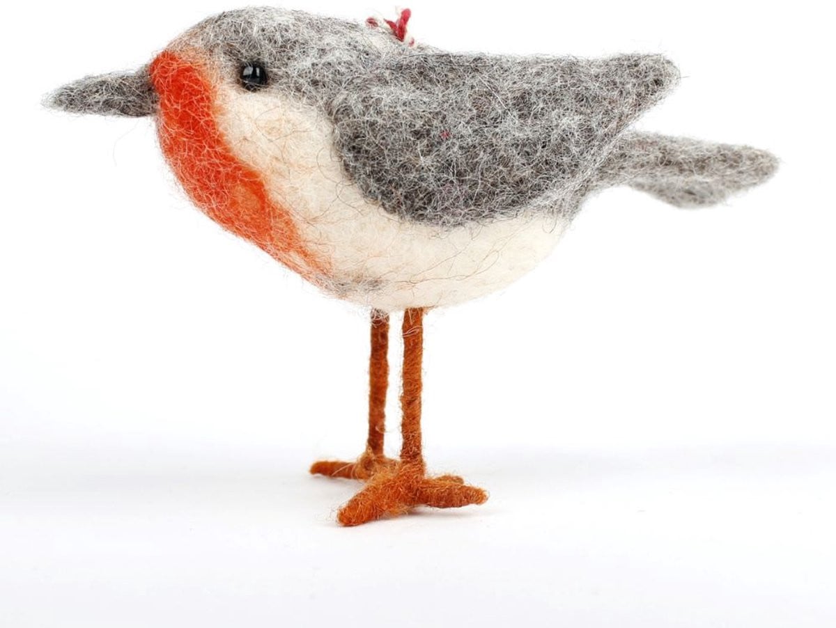 Diverse soorten vilten tuin vogels voor op tafel