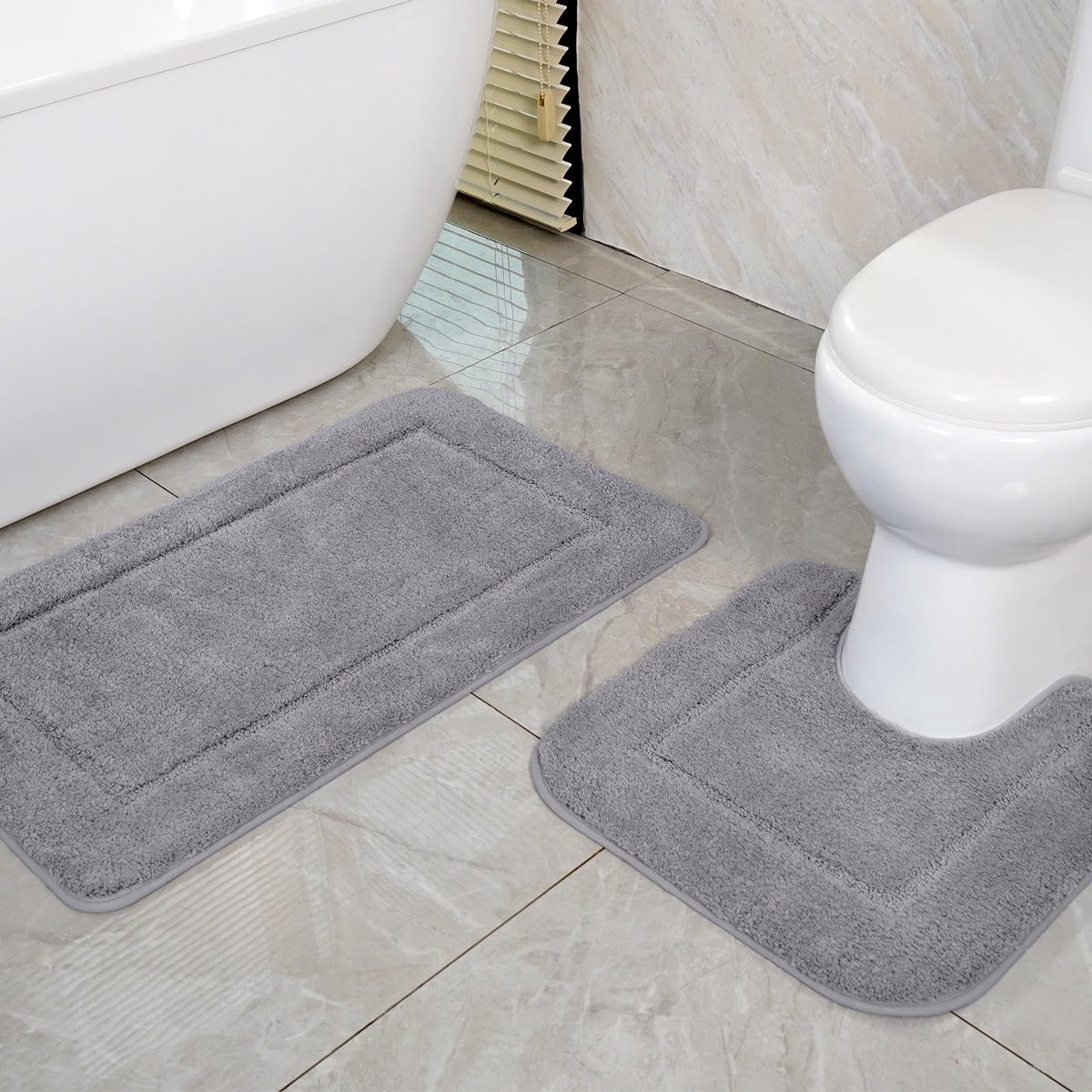 Unyqoos Grijze badmatten set van microvezel met antislip en sneldrogende eigenschappen