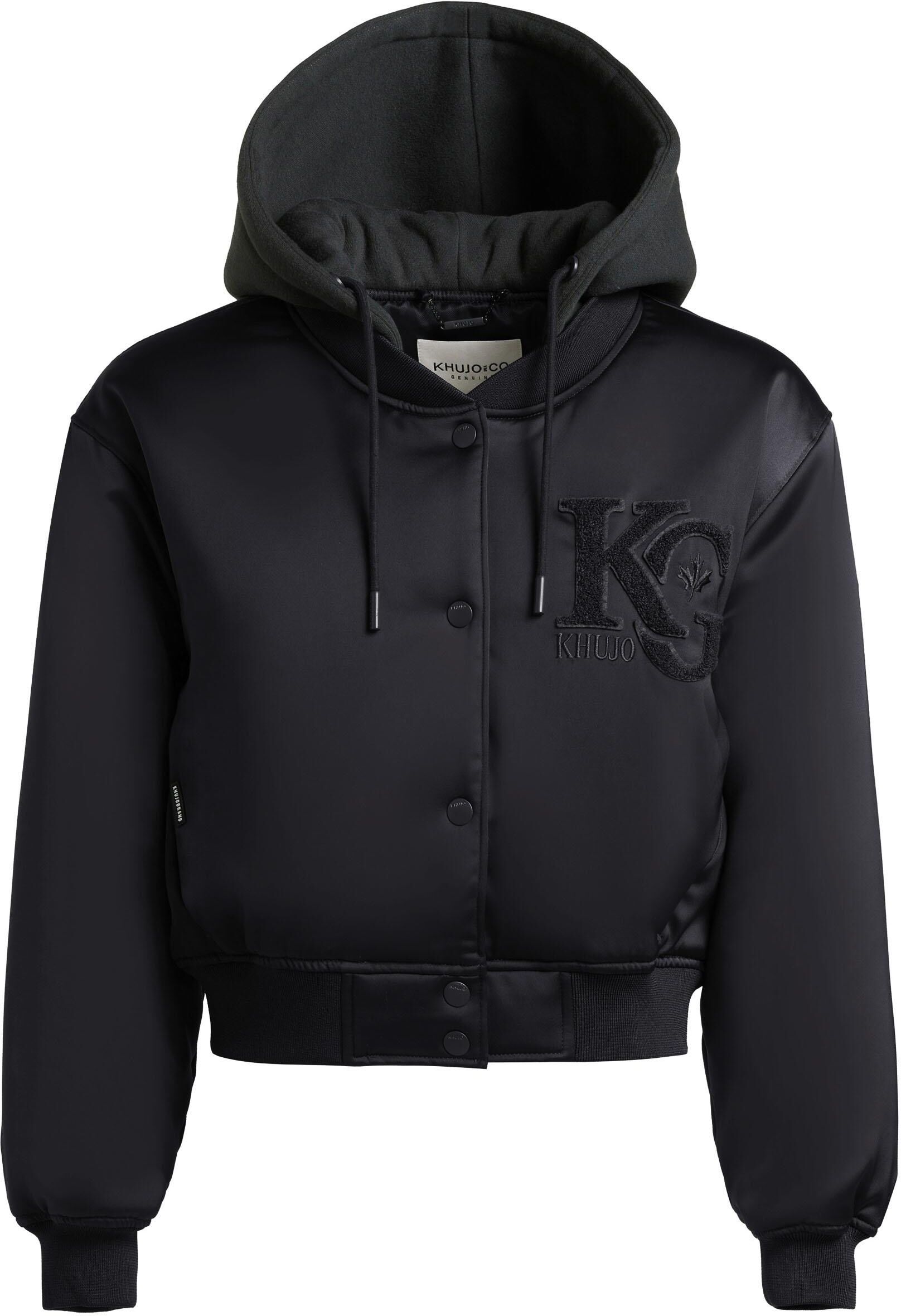 Collegejacke KHUJO "Collegejacke Chani", Damen, Gr. XXL, schwarz, Obermaterial: 97% Polyester PES. 3% Elasthan EL.  Obermaterial: Futter: 100% Polyester PES., oversize hüftlang, Ärmel ohne Ärmelschlitz Rippstrickbündchen, Jacken Collegejacke, Kurze Damen 