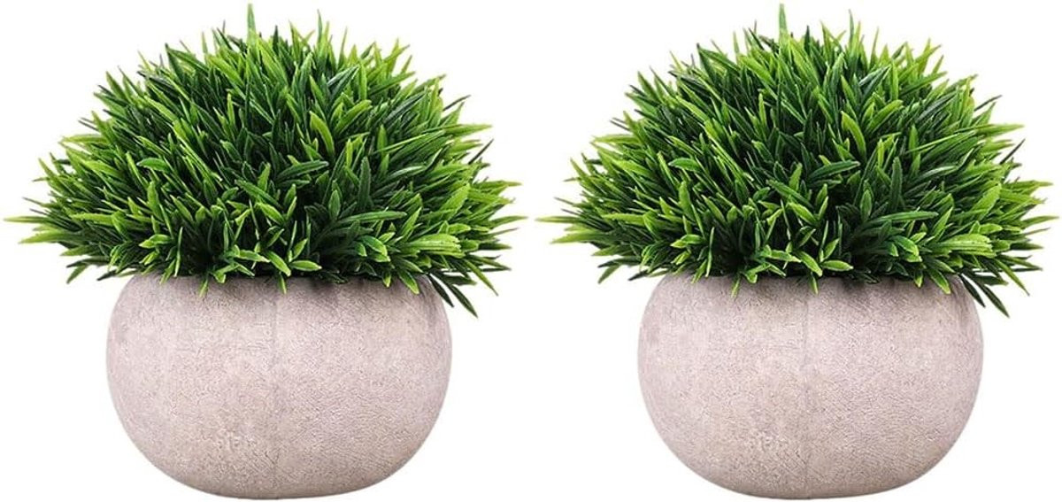 Merkloze groene kunstgras planten in schokbestendige natuurlijke potten voor decoratie