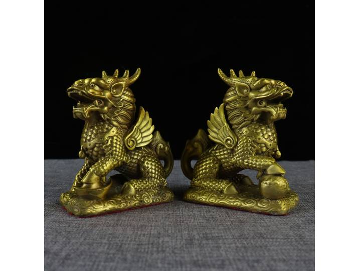 Une paire de Qilins, objets d'art en bronze antique à collectionner