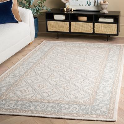 SAFAVIEH Handmade Ebony Tulun Wool Rug