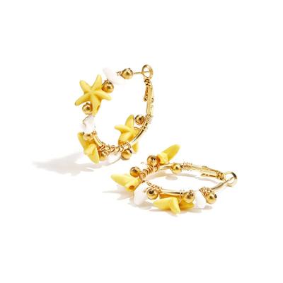 Paar Creolen ADELIA´S "LIVAYA Ohrringe Creolen mit Seestern-Motiv aus Edelstahl", Damen, Gr. Damen, Edelstahl, gold (gelb), Ohrringe, Modisch akzentuiert durch Seestern- und Kugel-Details