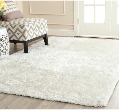 SAFAVIEH Handmade South Beach Leonella Shag Solid Polyester Rug