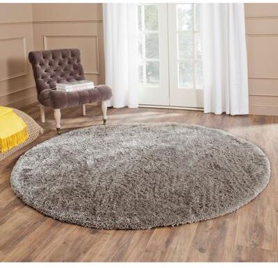 SAFAVIEH Handmade South Beach Leonella Shag Solid Polyester Rug