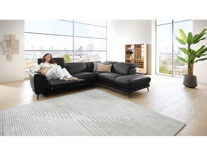 Leder Couch mit motor. Relaxfunktion und Kopfteilverstellung