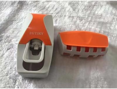 Uplifted Finds Automatic Toothpaste Dispenser & Holder   Premium Wall Mount Squeezer & Dust Proof Bathroom Infrastructure orange