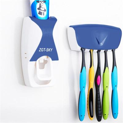 Snug & Styled Automatic Toothpaste Dispenser And Wall Mounted Toothbrush Holder Set blue