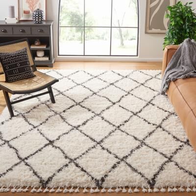 SAFAVIEH Handmade Flokati Deneen Shag Solid Polyester Rug