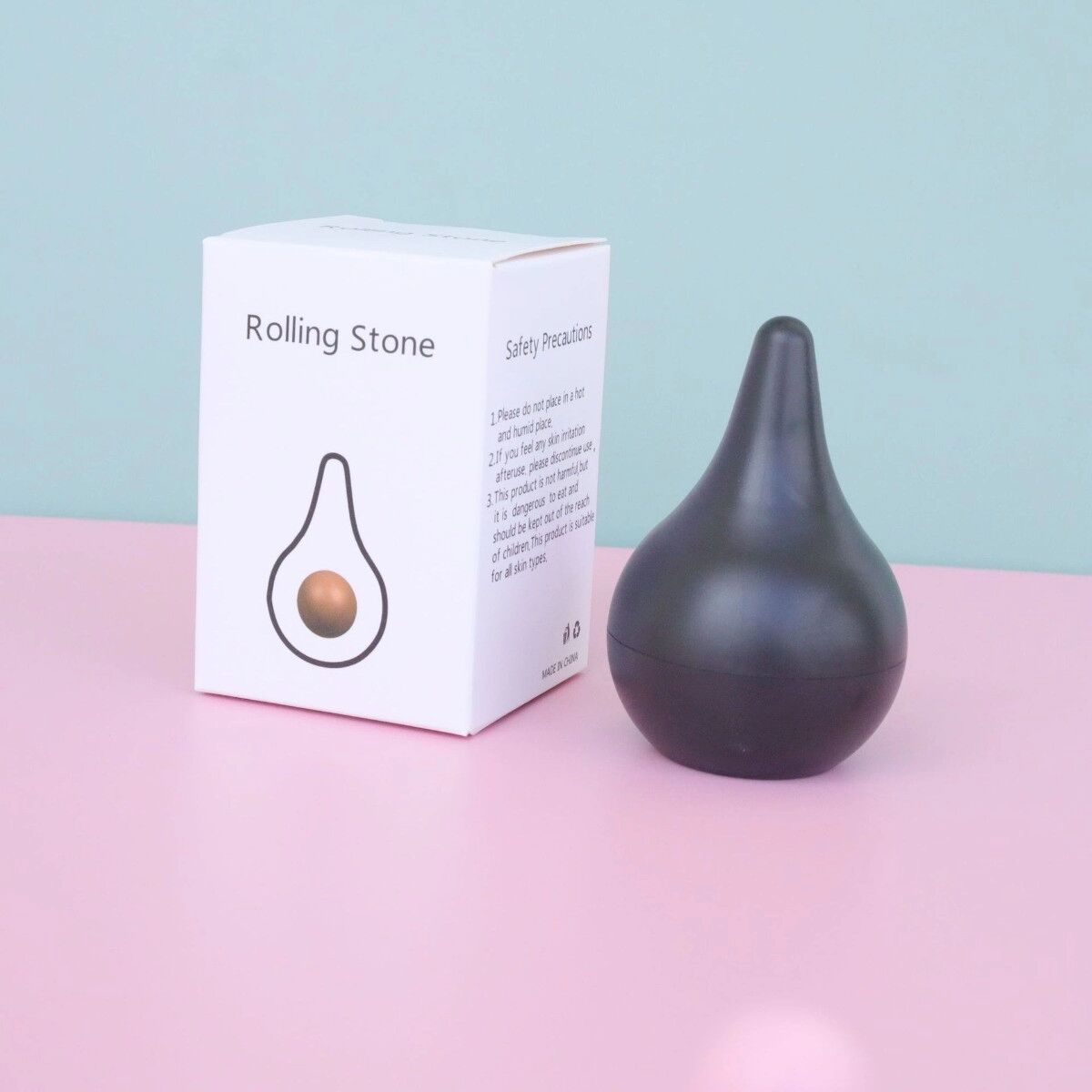 INF Tragbares Gesichtsmassagegerät mit Öl absorbierendem Rollerball aus Vulkanstein Schwarz