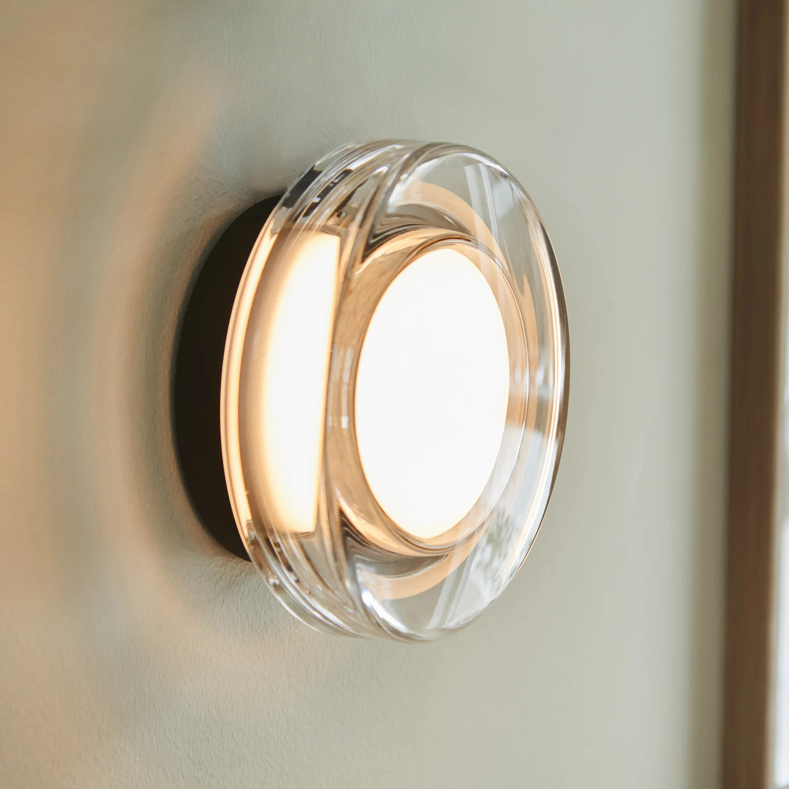 Loom Design Hugo LED wandlamp, transparant, Ø 17 cm, IP65, CCT