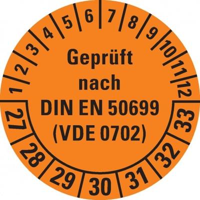 Dreifke® Prüfplakette geprüft nach DIN EN 50699(VDE 0702) 27-33, orange, Dokumentenfolie, Ø30mm, 108/Heft
