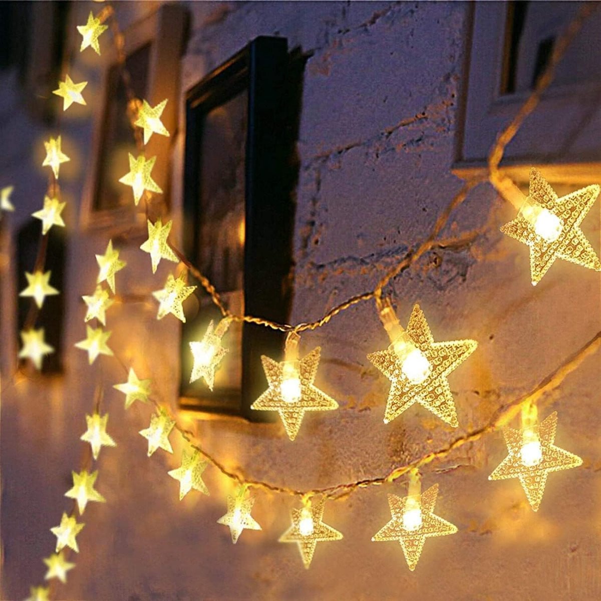 Stervormige LED-lichtslinger met 70 warm witte LED's, 10 meter, koperkleurig