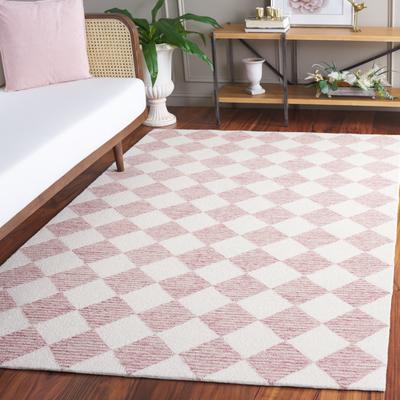 SAFAVIEH Hand-Tufted Ebony Todosia Modern & Contemporary Wool Rug