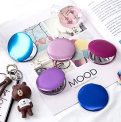 Inspire Curations Portable Magnifying Compact Makeup Mirror any One Of Them.