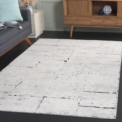 SAFAVIEH Hand-Tufted Kenya Sachie Southwestern Wool Rug
