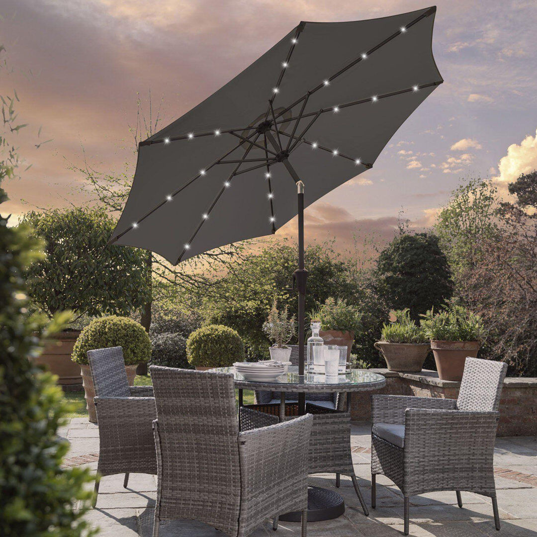 Lark Manor Dubose 4 - Person Wicker Patio Dining Set with Round Table , Cushions Included Grey 4