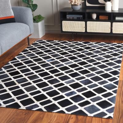 SAFAVIEH Handmade Studio Leather Marikukka Contemporary Leather Rug