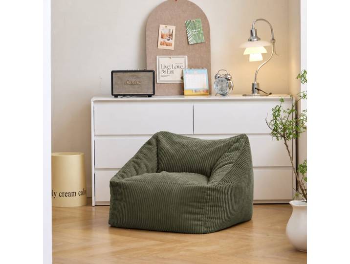 Pouf en velours côtelé vert