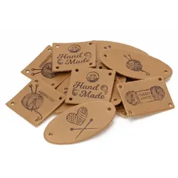 buttinette Label-Set "handmade Stricken", in Lederoptik, 3 – 6 cm, 15 Stück