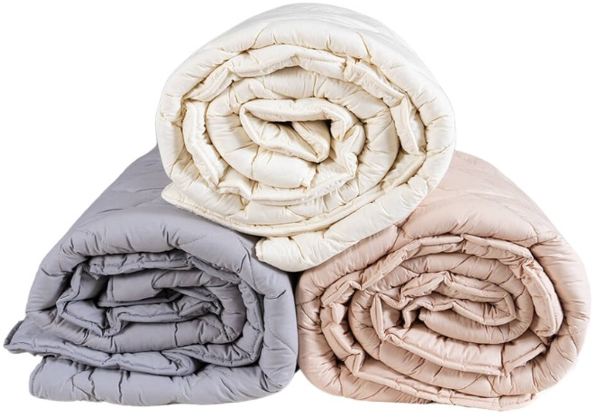 Warm babydekbed van 100% wol in beige