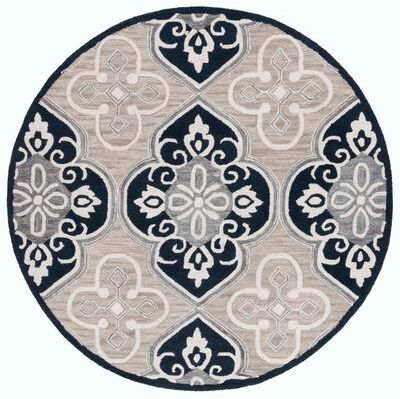 SAFAVIEH Handmade Aspen Dojka Floral Wool Rug