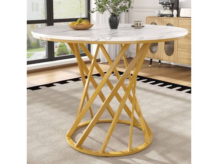 Table ronde pouvant accueillir quatre personnes idéale pour la salle à manger ou le salon avec des pieds en métal doré