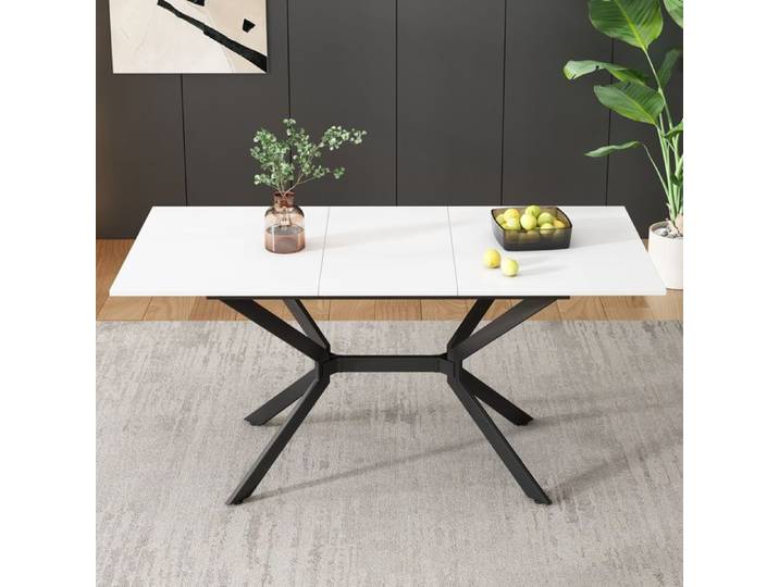 Table à manger extensible blanche de forme rectangulaire avec des pieds en métal noir pouvant accueillir quatre à six personnes