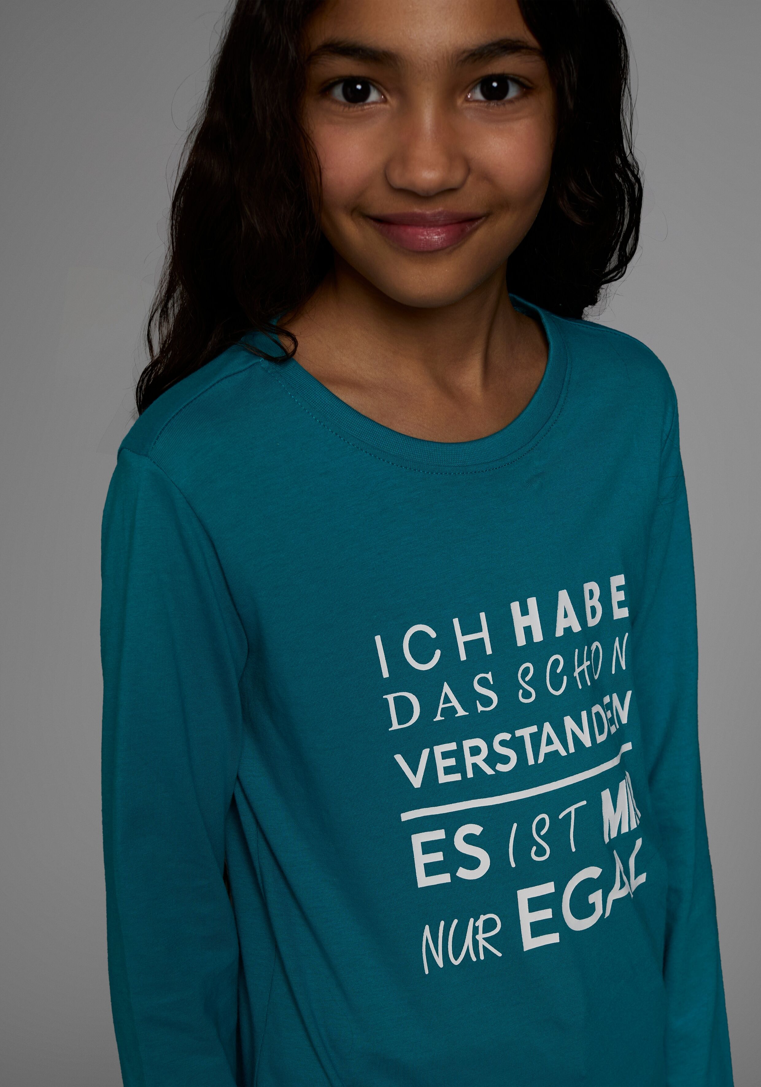 Langarmshirt KIDSWORLD "Ich hab das schon verstanden - es ist mir nur egal", Mädchen, Gr. 152/158, blau (petrol), Single Jersey, Obermaterial: 100% Baumwolle, bedruckt, Basic, Rundhals, Shirts Langarmshirt, Langarm, Basic-Passform, mit Statements/Sprüchen