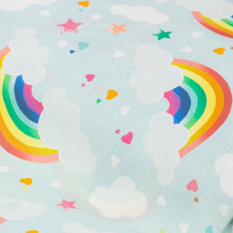 Baumwollstoff "Regenbogen", hellblau/bunt