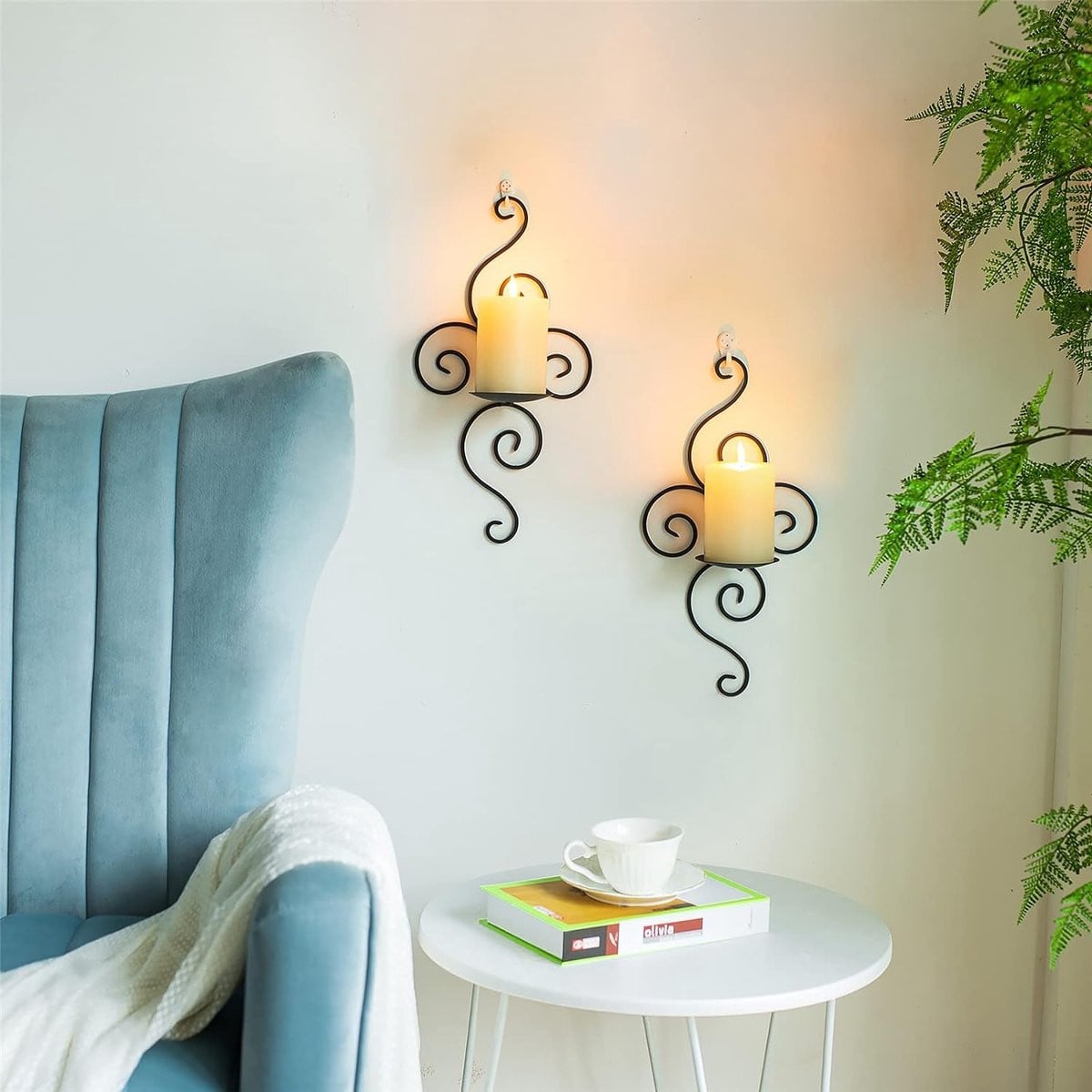 Set van 2 zwarte metalen wandkandelaars met modern abstract ontwerp voor pilaar- en theelichtkaarsen