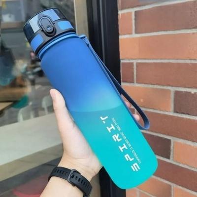 Uplifted Goods Large Capacity Sports Water Bottle With Motivational Markings For Travel Gym And Outdoor Use blue Green 33.8 Oz.