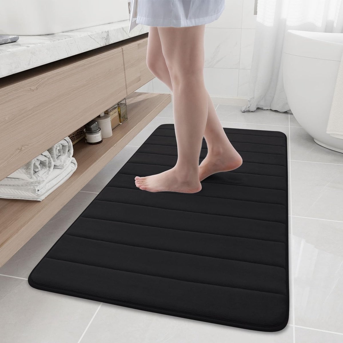 Unyqoos Zwarte absorberende badmat met traagschuim en antislip