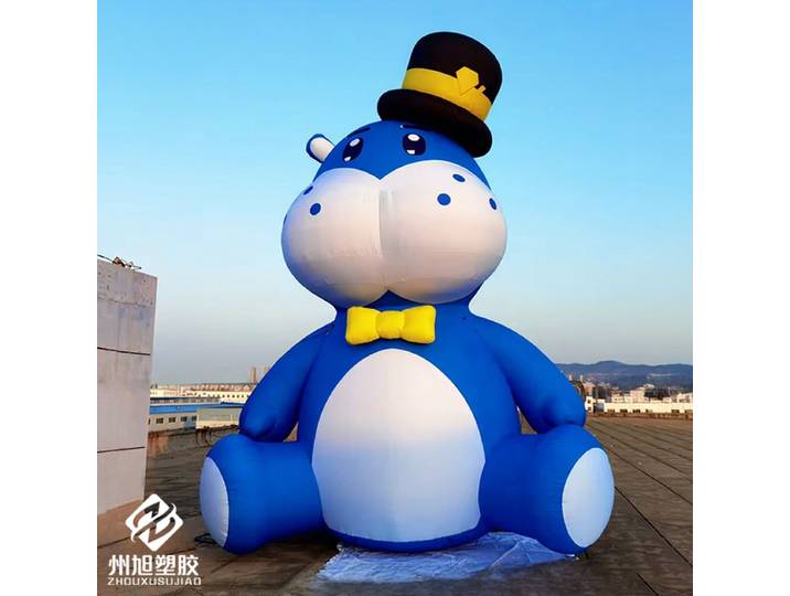 Hippopotame gonflable, modèle d'animal de dessin animé pour extérieur, mascotte hippopotame gonflable bleue avec un chapeau