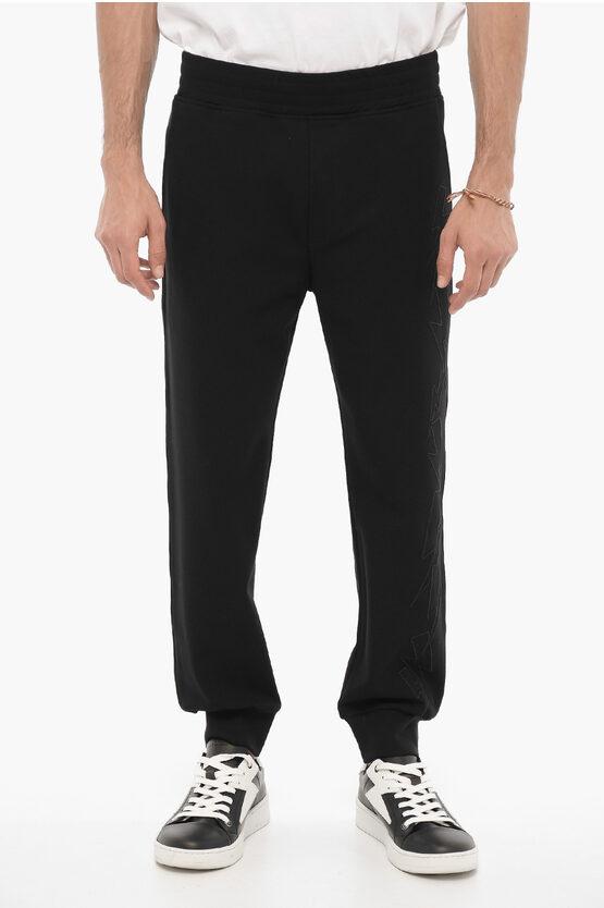 Skinny Fit JUMBLED BOLTS Jogginghose mit Stickereien in Schwarz