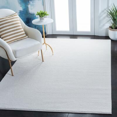 SAFAVIEH Plain And Solid Renske Rug