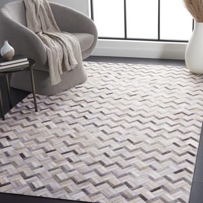 SAFAVIEH Handmade Studio Leather Emma Mid-Century Modern Rug