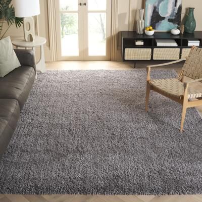 SAFAVIEH Handmade Classic Shag Nakhshun Rug