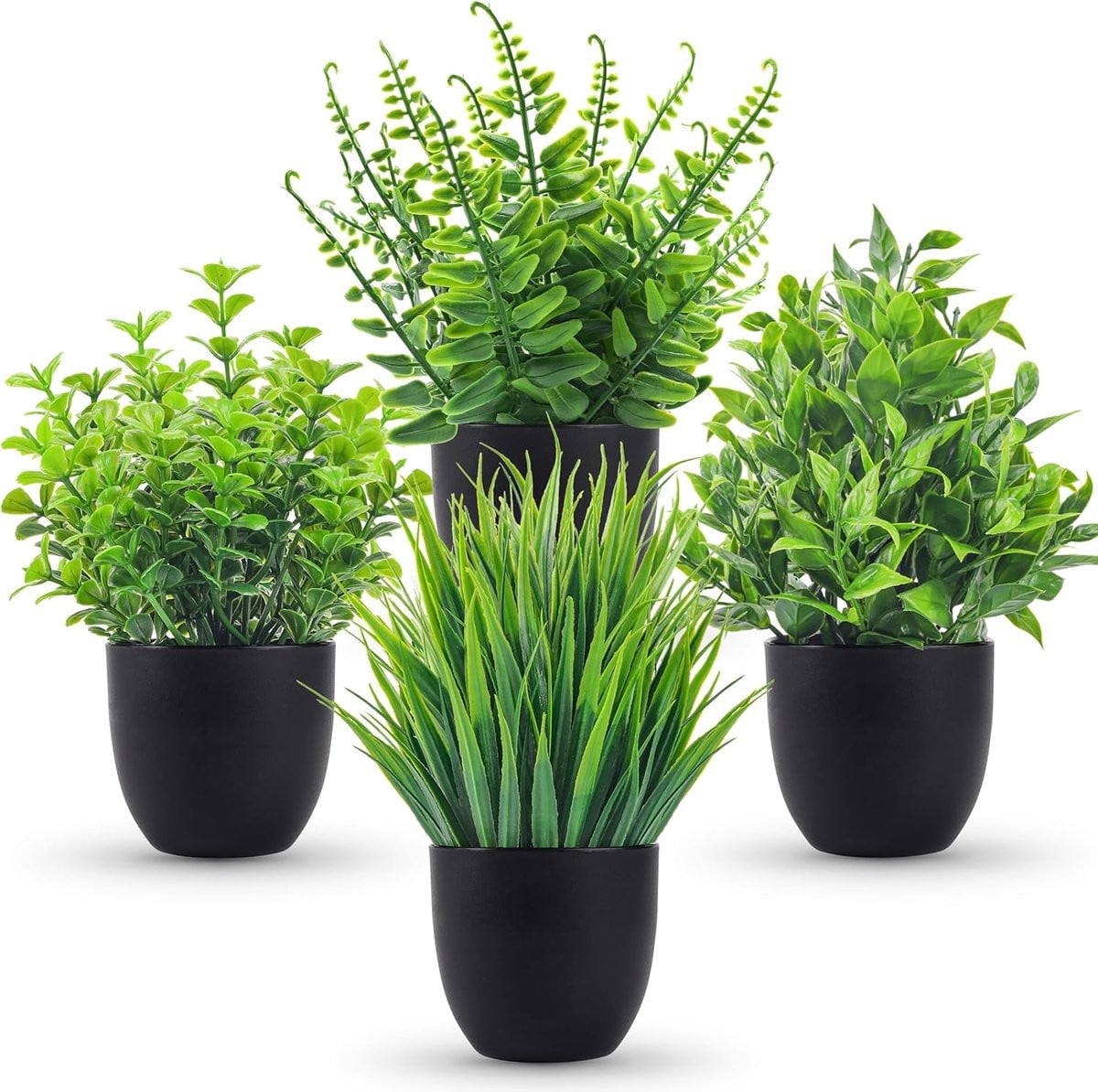 Kleine groene kunstplant in zwarte pot voor decoratie in de badkamer, het thuiskantoor of op het bureau