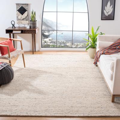 SAFAVIEH Handmade Himalaya Modern & Contemporary Solid Ivory Wool Rug