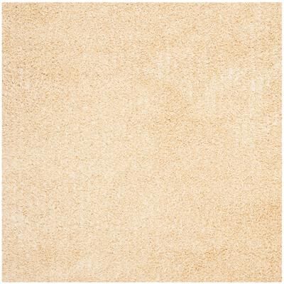 SAFAVIEH Handmade Monterey Shag Mevlide Solid Polyester Rug