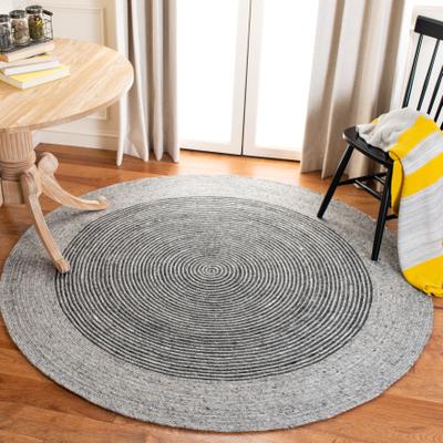 SAFAVIEH Handmade Braided Nooria Wool Rug