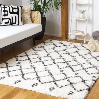 SAFAVIEH Handmade Flokati Melony Shag Solid Polyester Rug