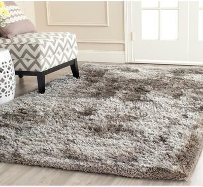 SAFAVIEH Handmade South Beach Leonella Shag Solid Polyester Rug