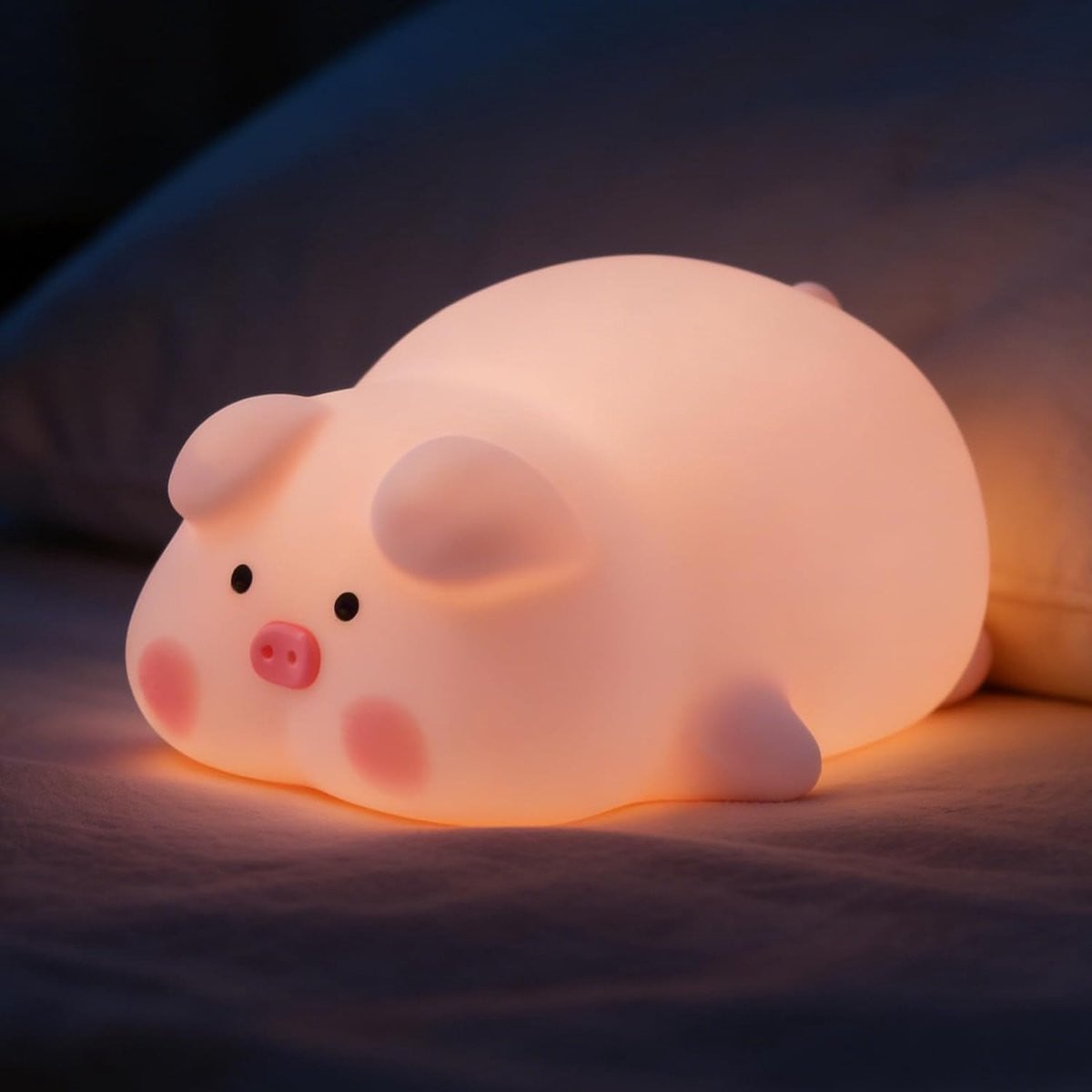 Roze siliconen babylampje in de vorm van een varkentje met USB-voeding