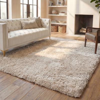 SAFAVIEH Handmade South Beach Leonella Shag Solid Polyester Rug