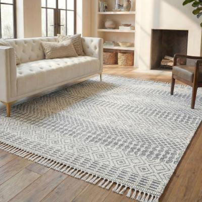 SAFAVIEH Handmade Natura Chiang Wool Fringe Rug