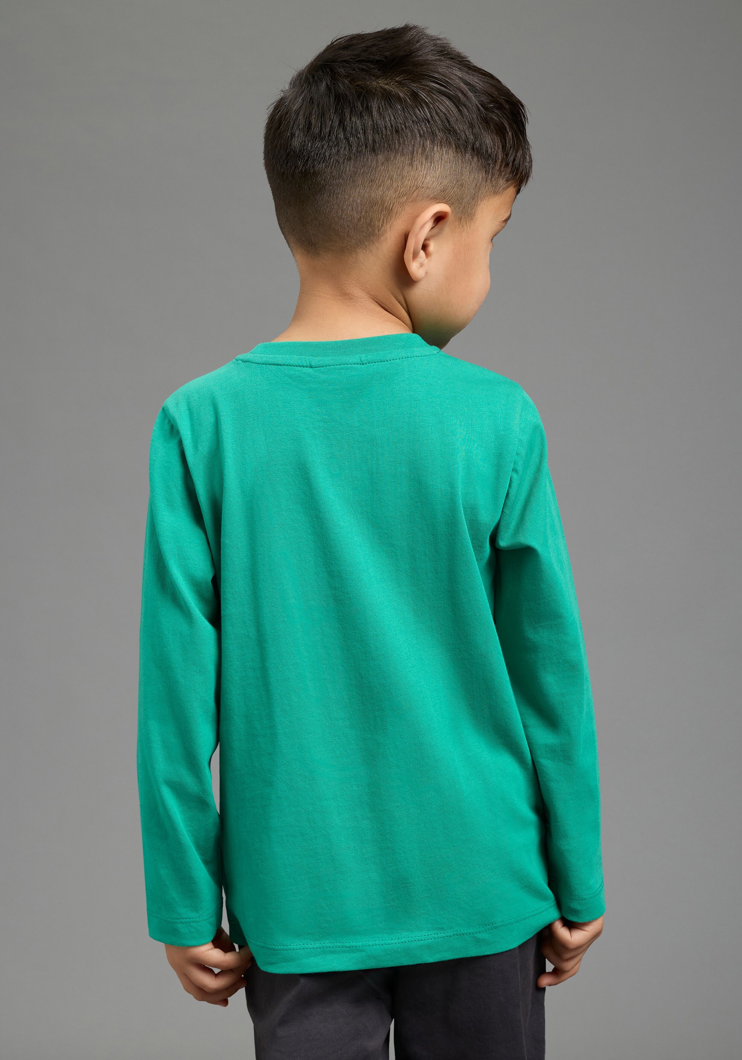 Langarmshirt KIDSWORLD "Feuerwehr Pailletten Shirt", Jungen, Gr. 140/146, grün, Single Jersey, Obermaterial: 100% Baumwolle, Basic hüftlang, Rundhals, Shirts Langarmshirt, Shirt mit Feuerwehr Wende-Pailletten grün 140/146