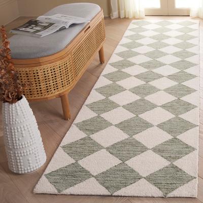 SAFAVIEH Hand-Tufted Ebony Todosia Modern & Contemporary Wool Rug