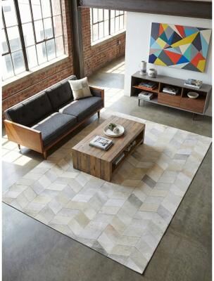 EXQUISITE RUGS Natural Hide Hand-stitched Leather Hide Ivory Area Rug.